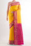 Pure Silk Yellow Bangalore Saree with Zari Butta on the body and Zari Border.  displayed on a mannequin