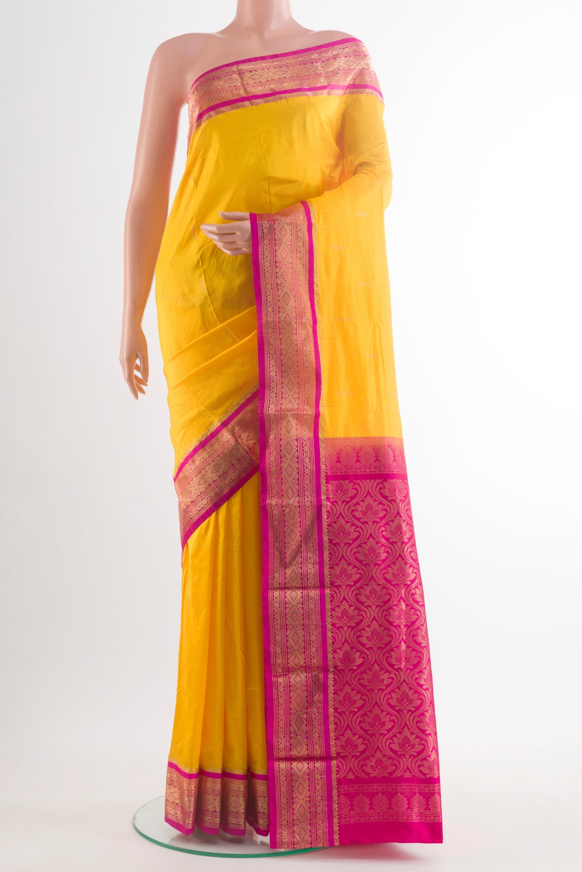 Pure Silk Yellow Bangalore Saree with Zari Butta on the body and Zari Border.  displayed on a mannequin