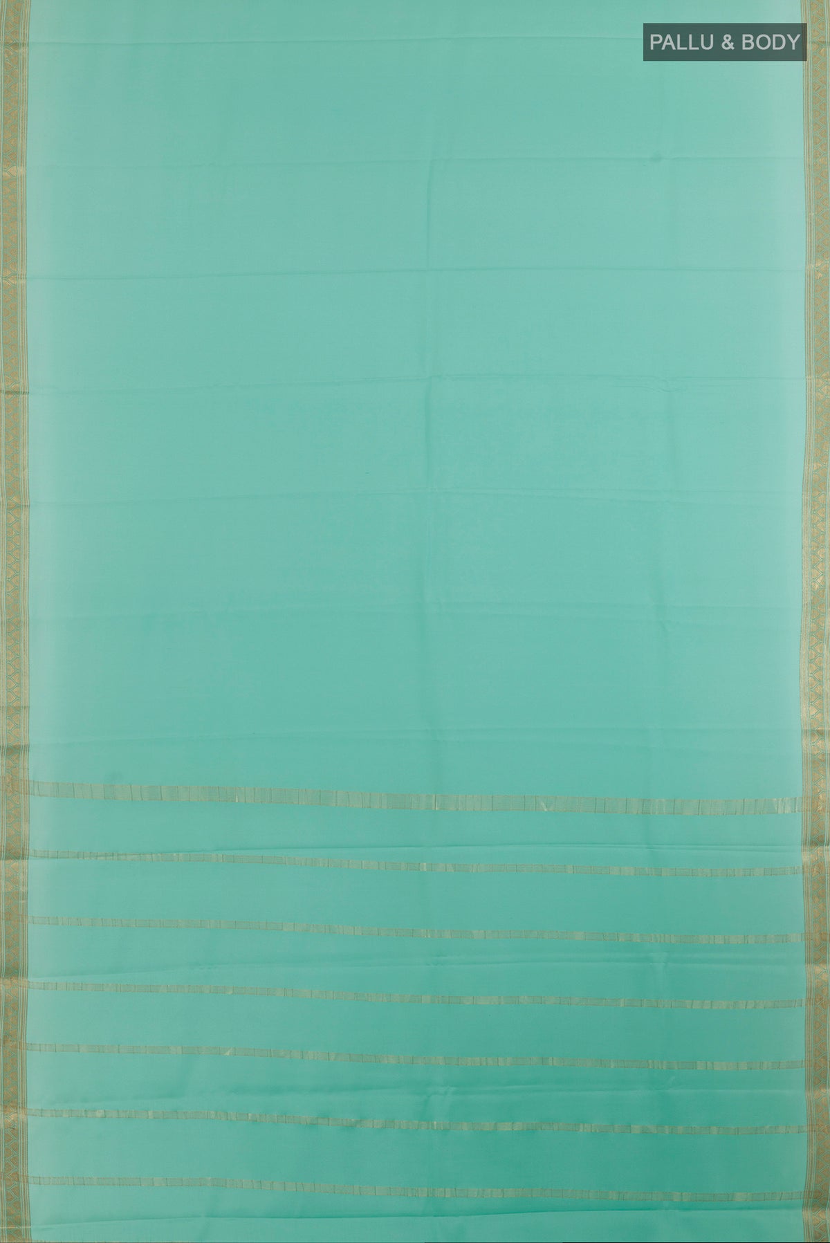 Flat view of Sea Green Mysore Crepe Saree with Plain Body and Zari Border. 