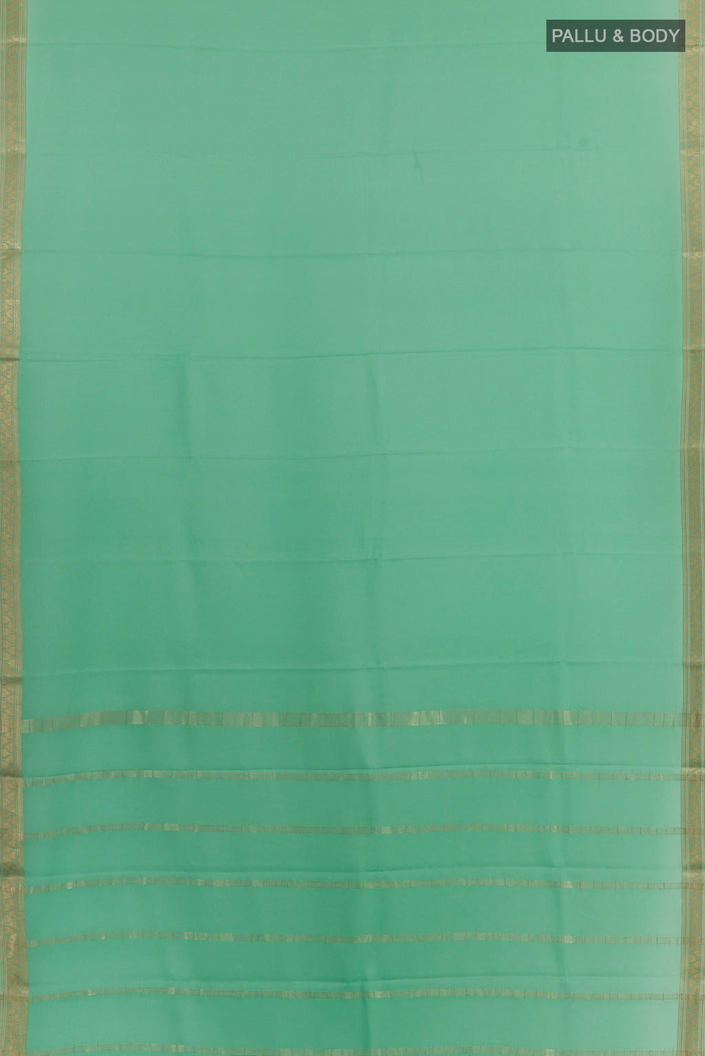 Flat view of Mint Green Mysore Crepe Saree with Plain Body and Zari Border. 