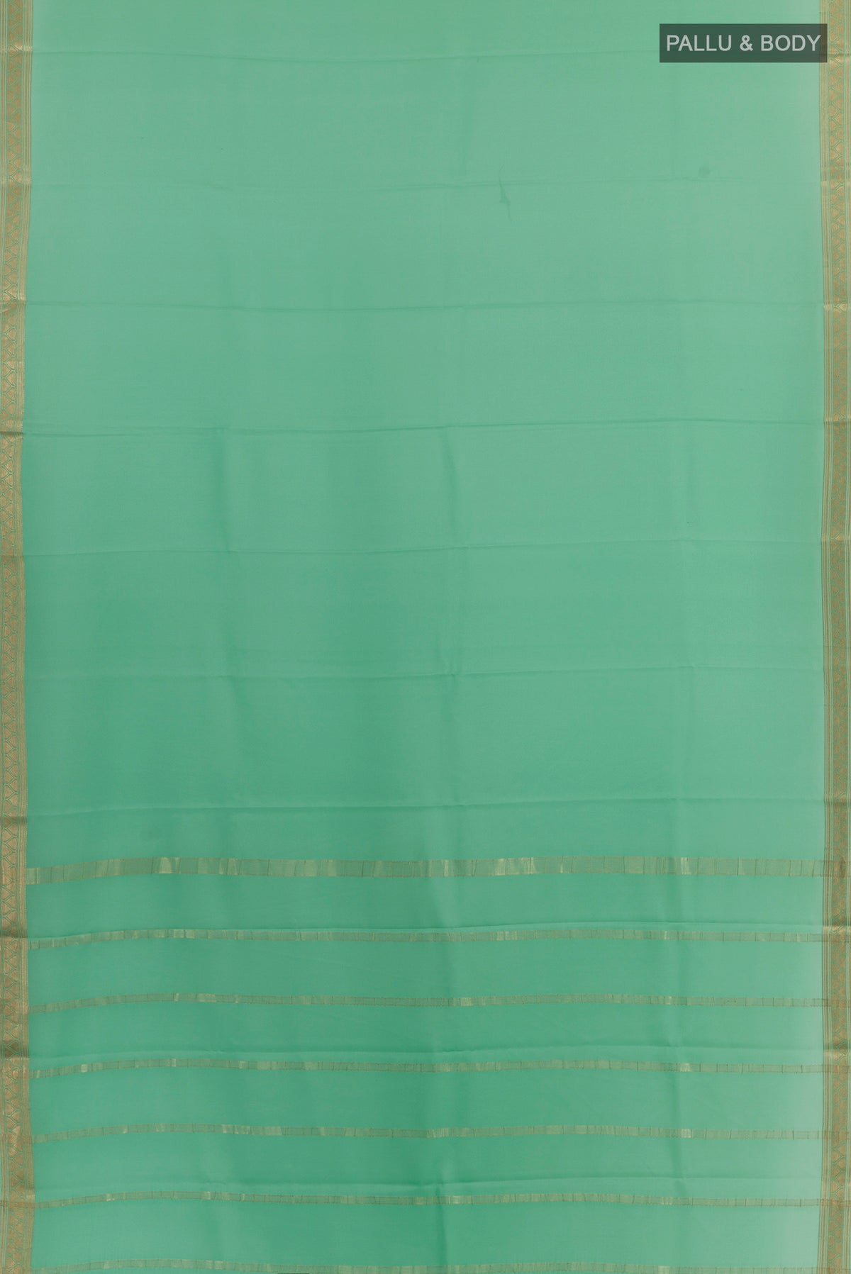 Flat view of Mint Green Mysore Crepe Saree with Plain Body and Zari Border. 