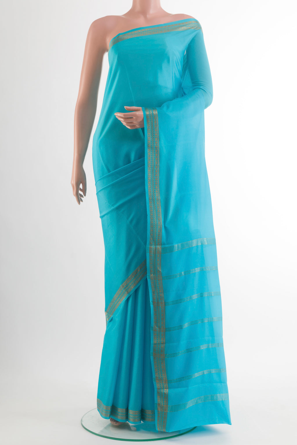 Blue Mysore Crepe Saree with Plain Body and Zari Border.  displayed on a mannequin