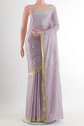 Grey Mysore Crepe Saree with Plain Body and Zari Border.  displayed on a mannequin