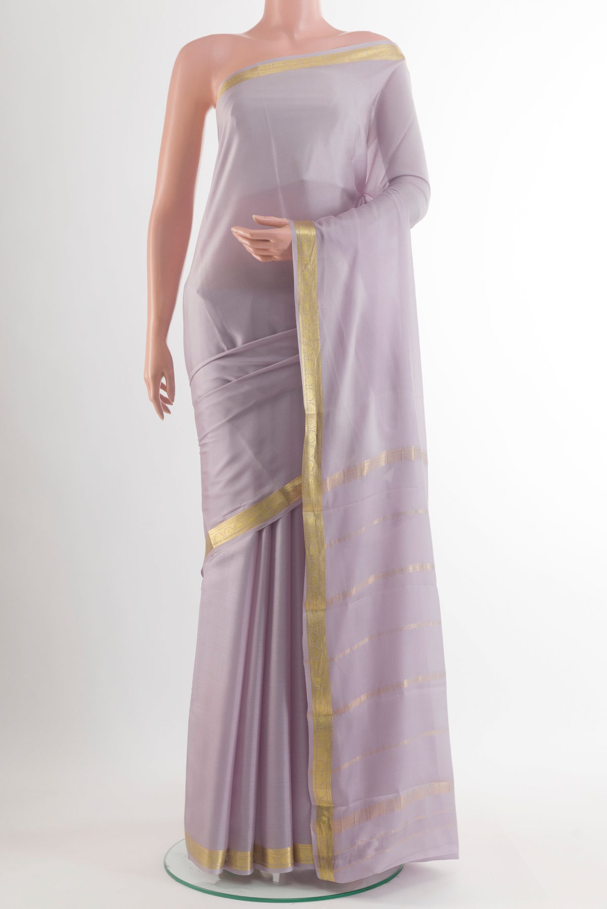 Grey Mysore Crepe Saree with Plain Body and Zari Border.  displayed on a mannequin