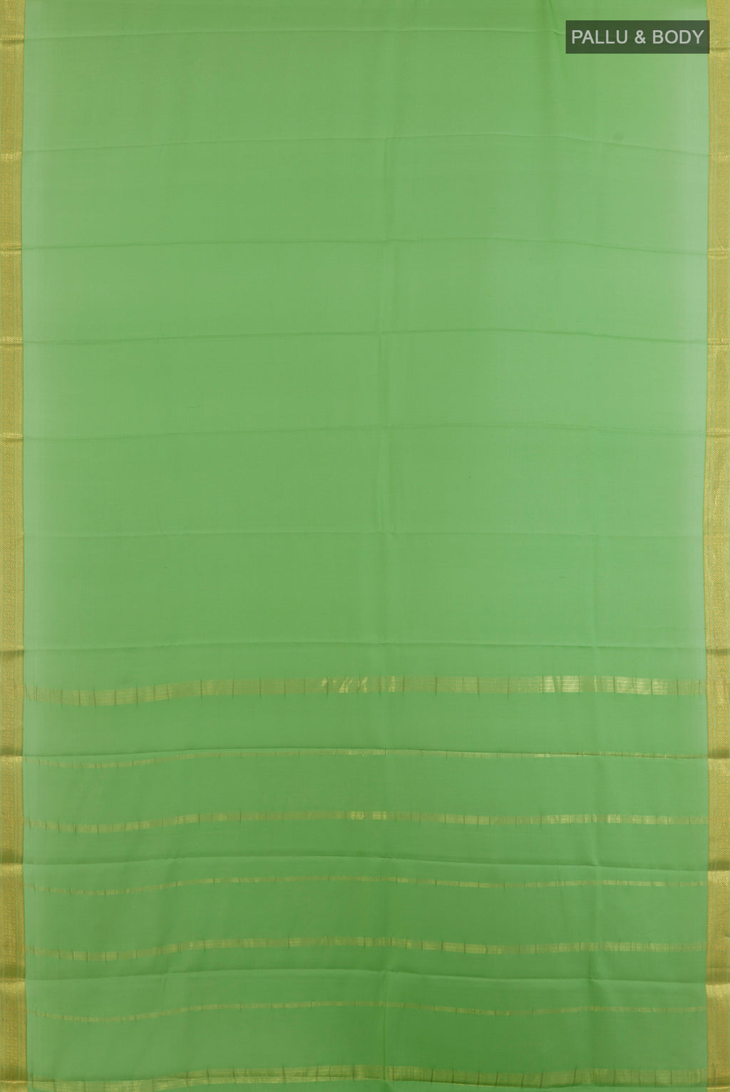 Flat view of Green Mysore Crepe Saree with Plain Body and Zari Border. 