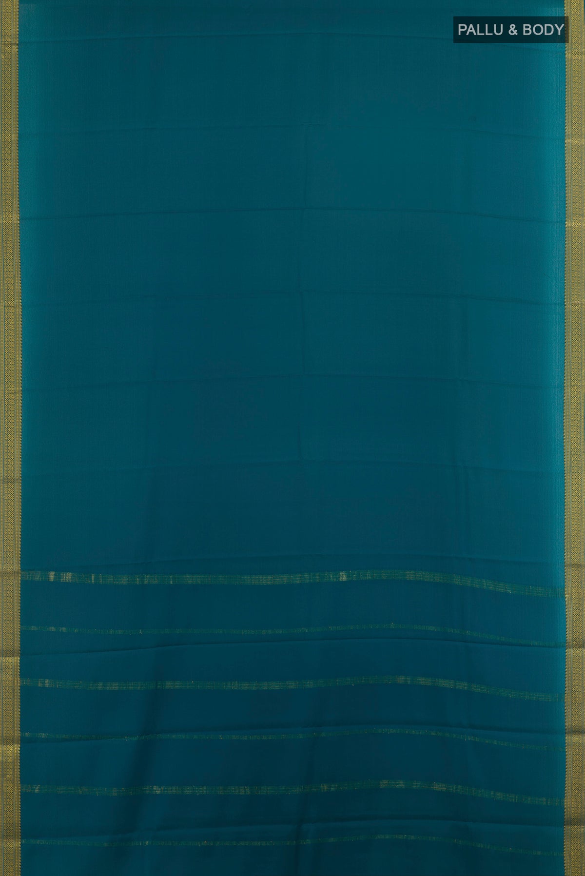 Flat view of Teal Mysore Crepe Saree with Plain Body and Zari Border. 