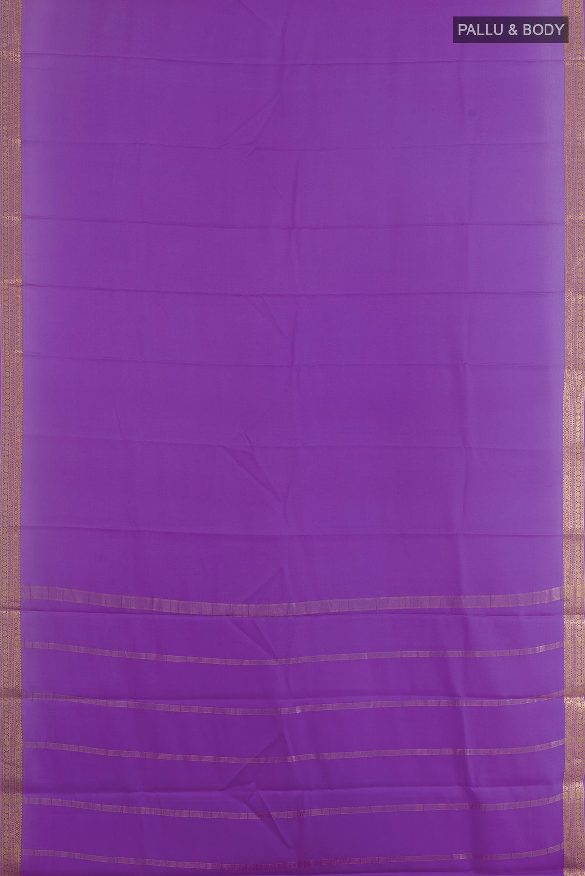 Flat view of Lavender Mysore Crepe Saree with Plain Body and Zari Border. 