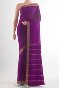 Purple Mysore Crepe Saree with Plain Body and Zari Border.  displayed on a mannequin