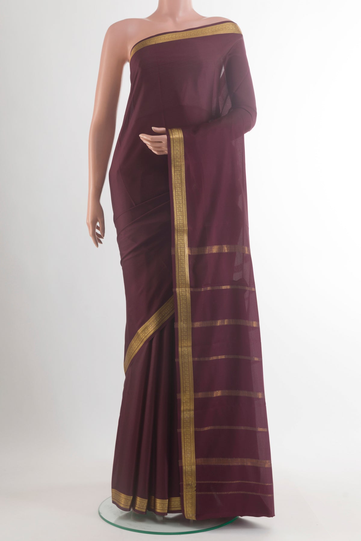 Pure Silk Coffee Brown Mysore Silk Saree with Plain Body and Zari Border.  displayed on a mannequin