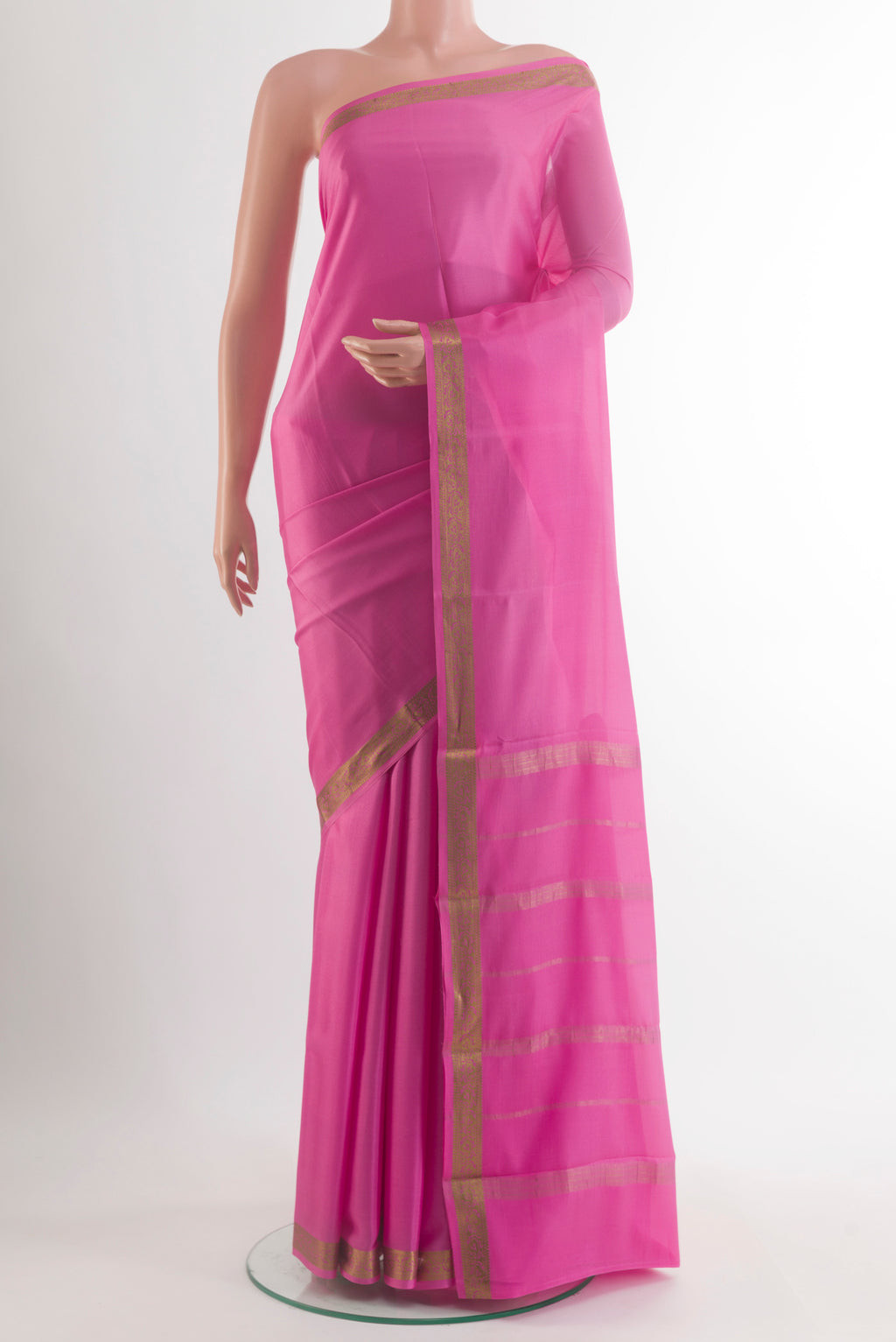 Pink Mysore Crepe Saree with Plain Body and Zari Border.  displayed on a mannequin
