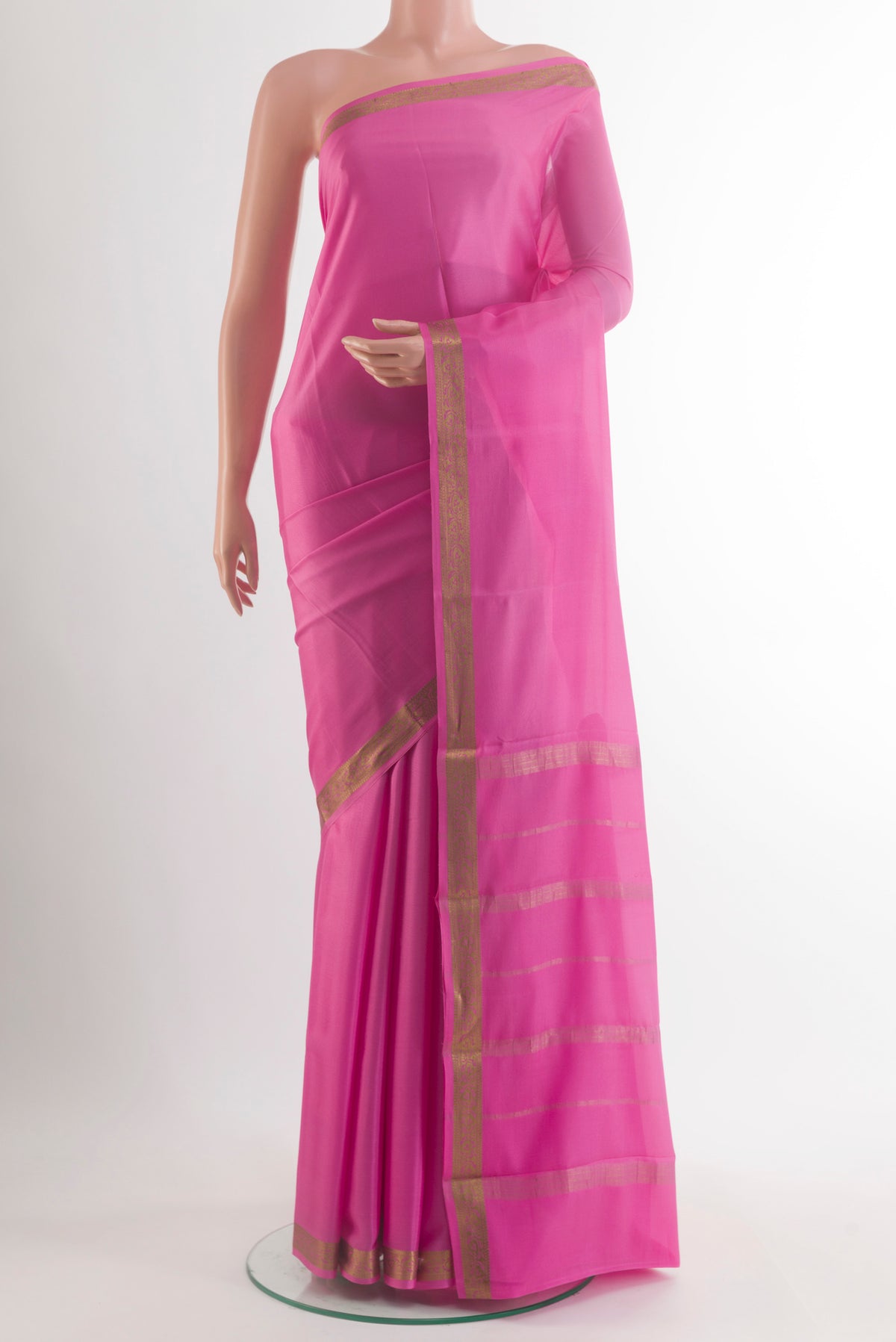 Pink Mysore Crepe Saree with Plain Body and Zari Border.  displayed on a mannequin