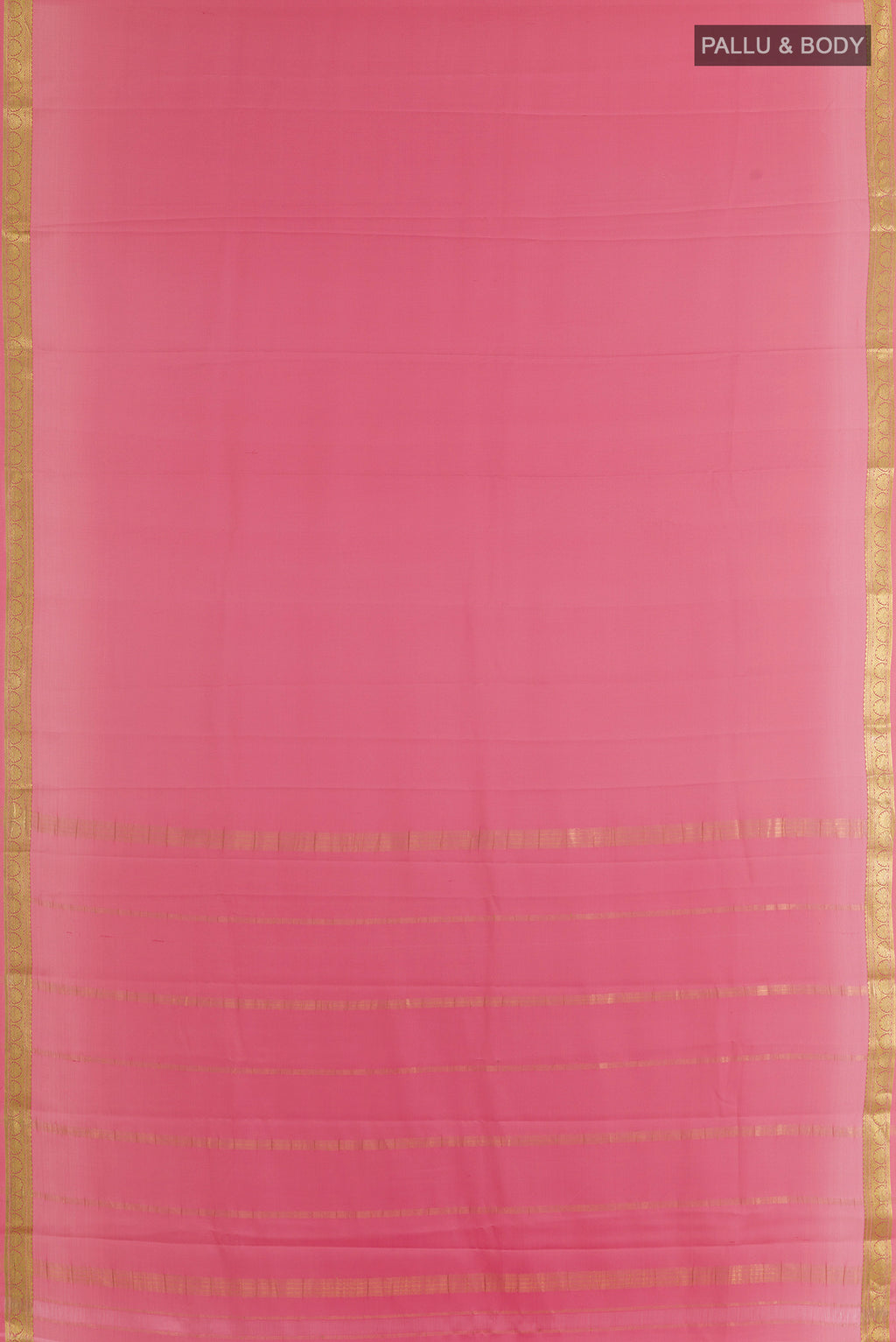 Flat view of Peach Mysore Crepe Saree with Plain Body and Zari Border. 