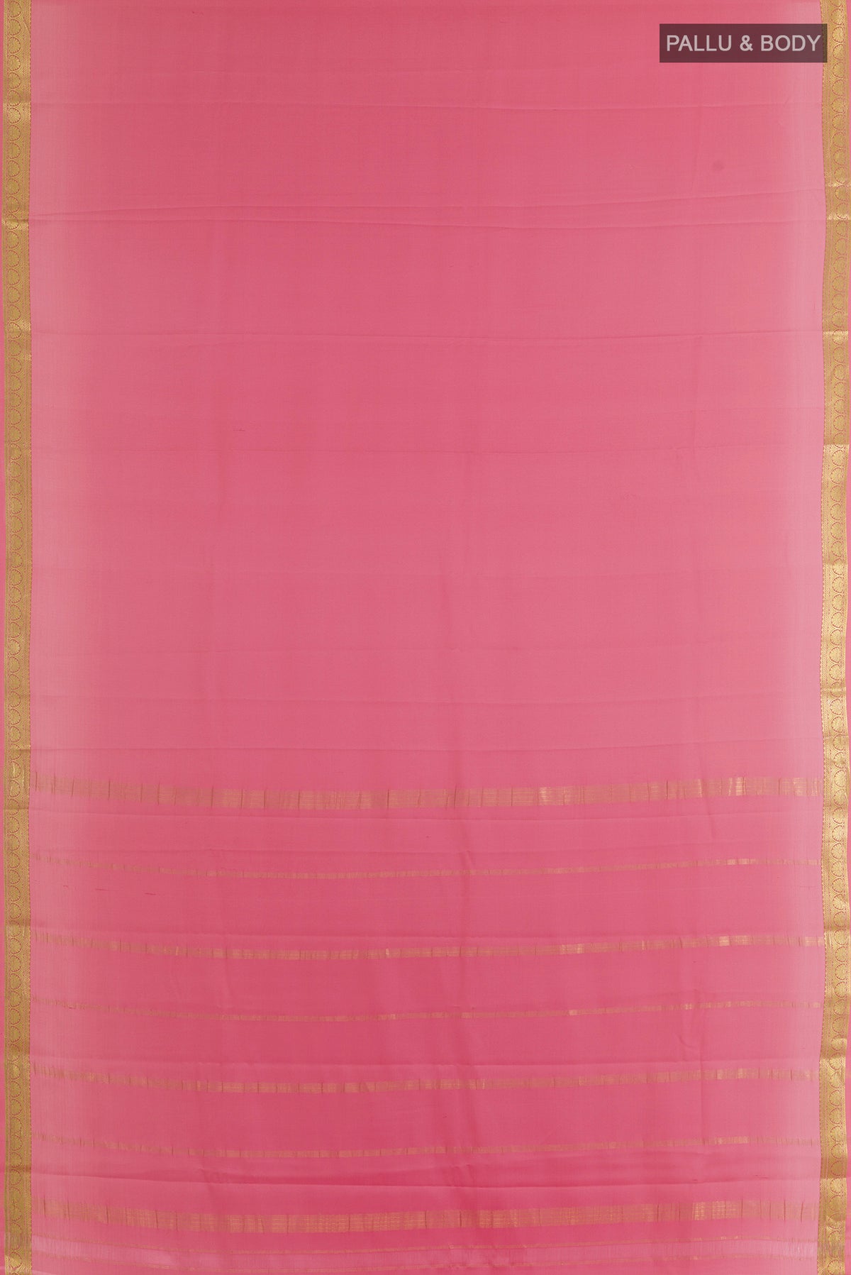 Flat view of Peach Mysore Crepe Saree with Plain Body and Zari Border. 