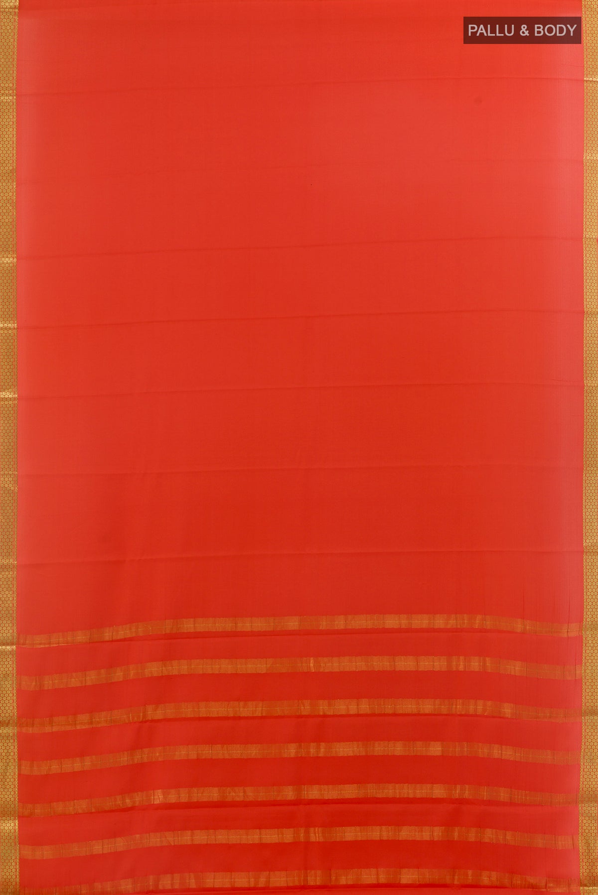 Flat view of Orange Mysore Crepe Saree with Plain Body and Zari Border. 