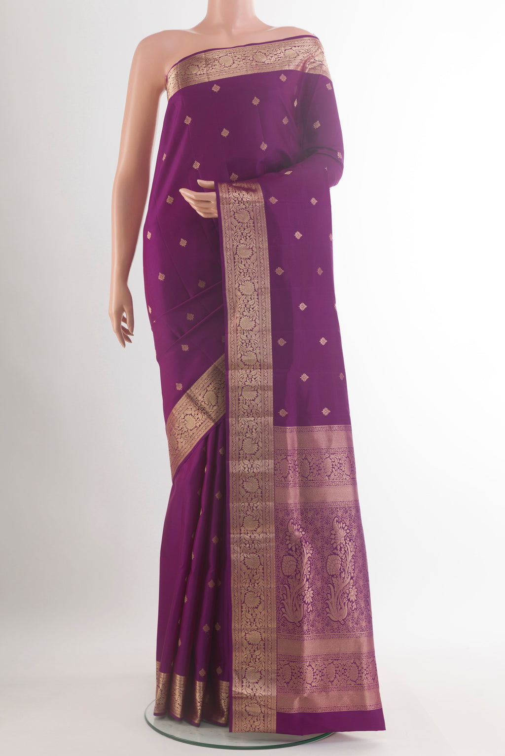 Pure Silk Purple Soft Saree with Zari Butta on the body and Zari Border.  displayed on a mannequin