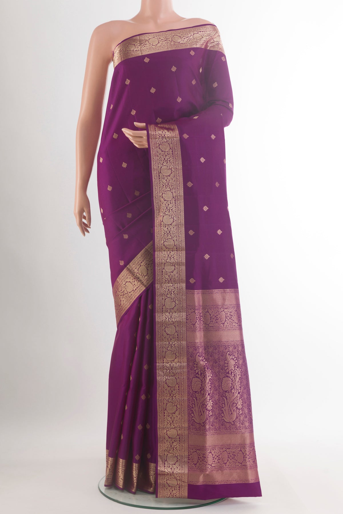 Pure Silk Purple Soft Saree with Zari Butta on the body and Zari Border.  displayed on a mannequin