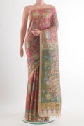 Peach Tussar Saree with kalamkari Print on the body and Zari Border.  displayed on a mannequin