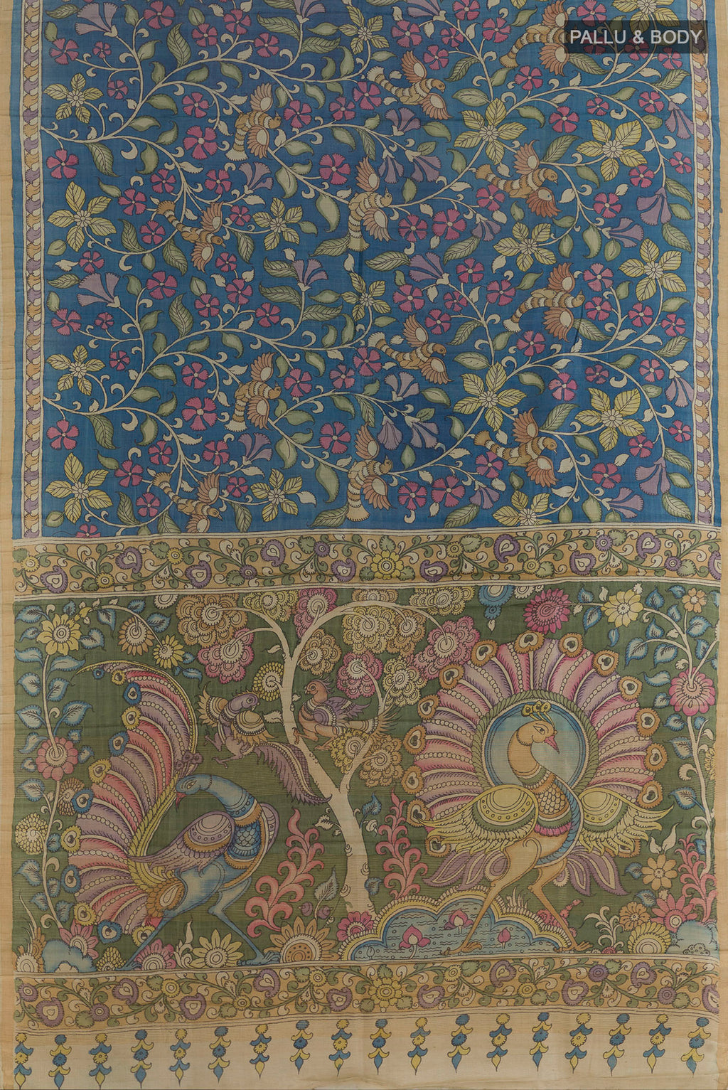Flat view of Blue Tussar Saree with kalamkari Print on the body and Zari Border. 