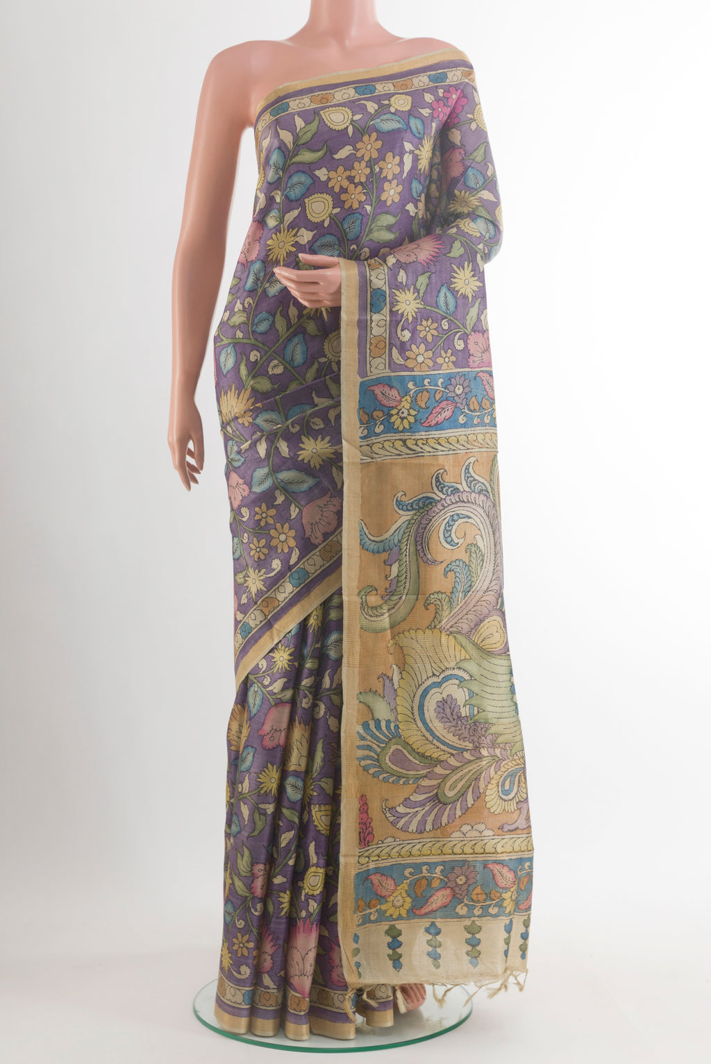Lavender Tussar Saree with Printed design on the body and Zari Border.  displayed on a mannequin