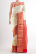 Pure Silk Off White Kanchipuram Saree with Zari Butta on the body and Zari Border.  displayed on a mannequin