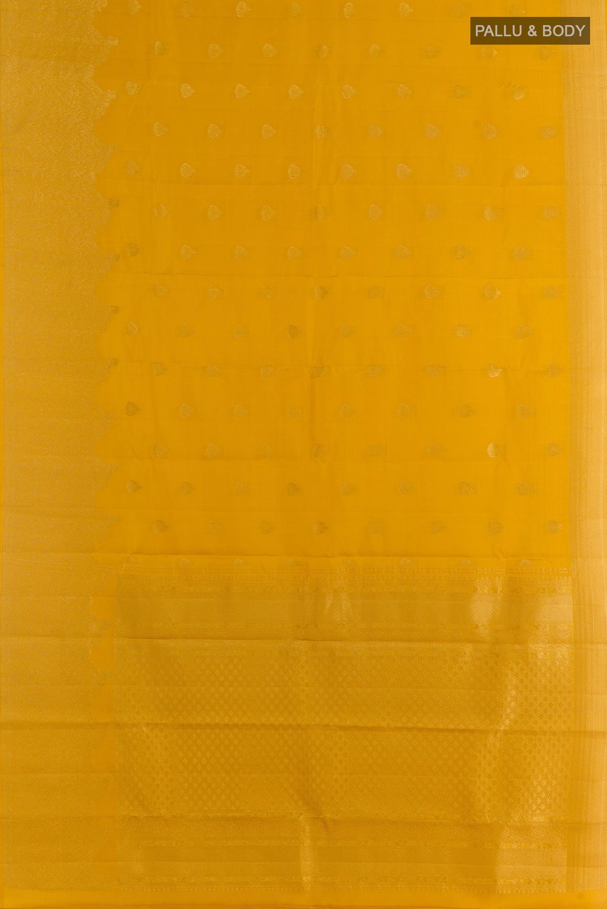 Flat view of Pure Silk Mustard Kanchipuram Saree with Zari Butta on the body and Zari Border. 