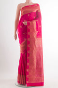 Pure Silk Pink Kanchipuram Saree with Zari Butta on the body and Zari Border.  displayed on a mannequin