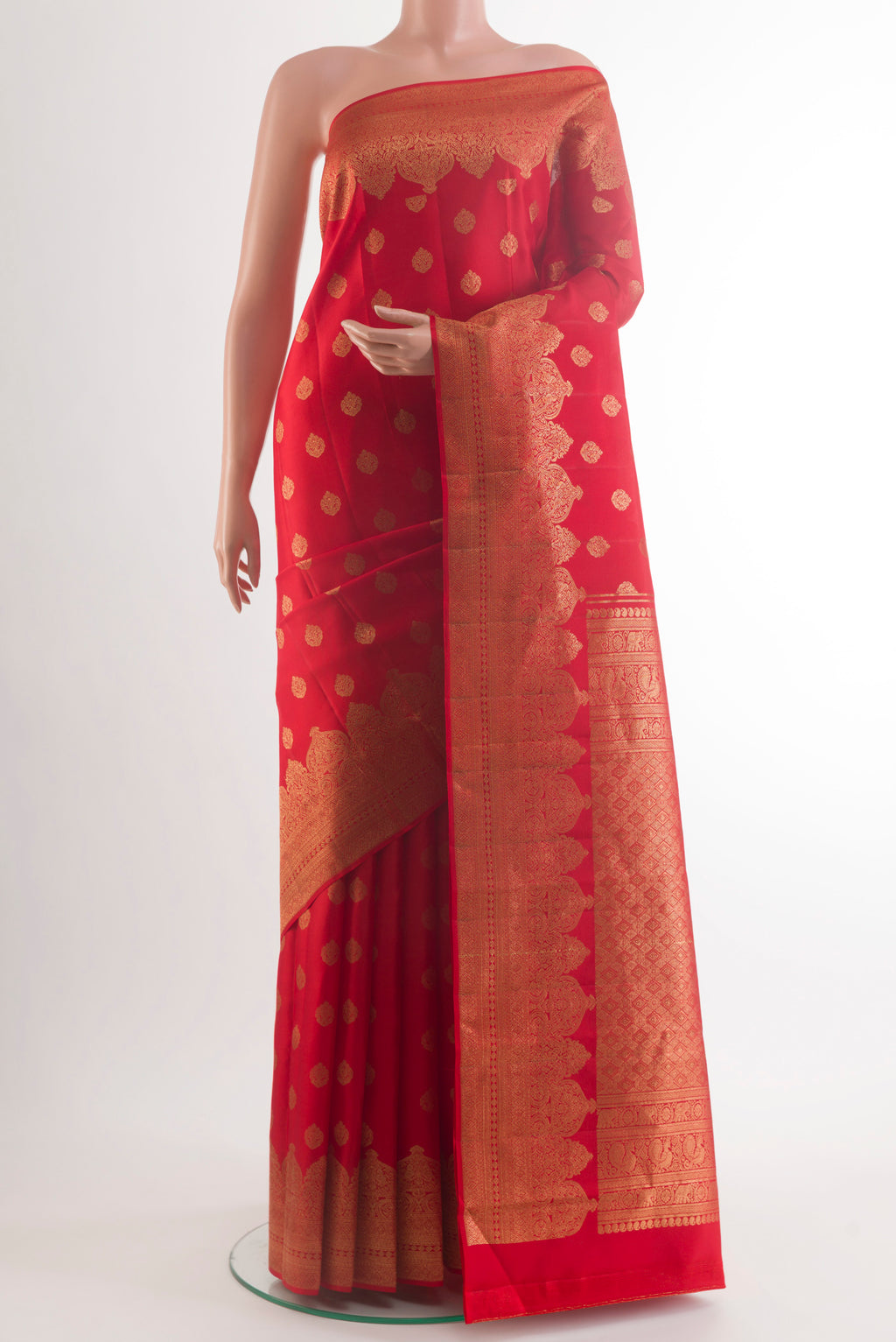 Pure Silk Red Kanchipuram Saree with Zari Brocade on the body and Zari Border.  displayed on a mannequin