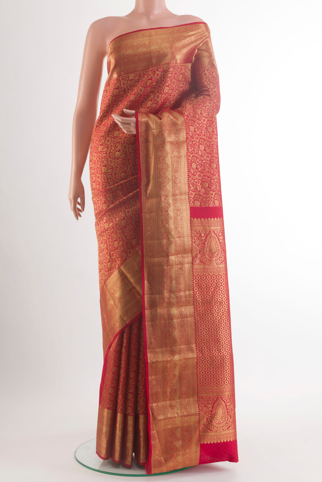 Pure Silk Red Kanchipuram Saree with Zari Brocade on the body and Zari Border.  displayed on a mannequin
