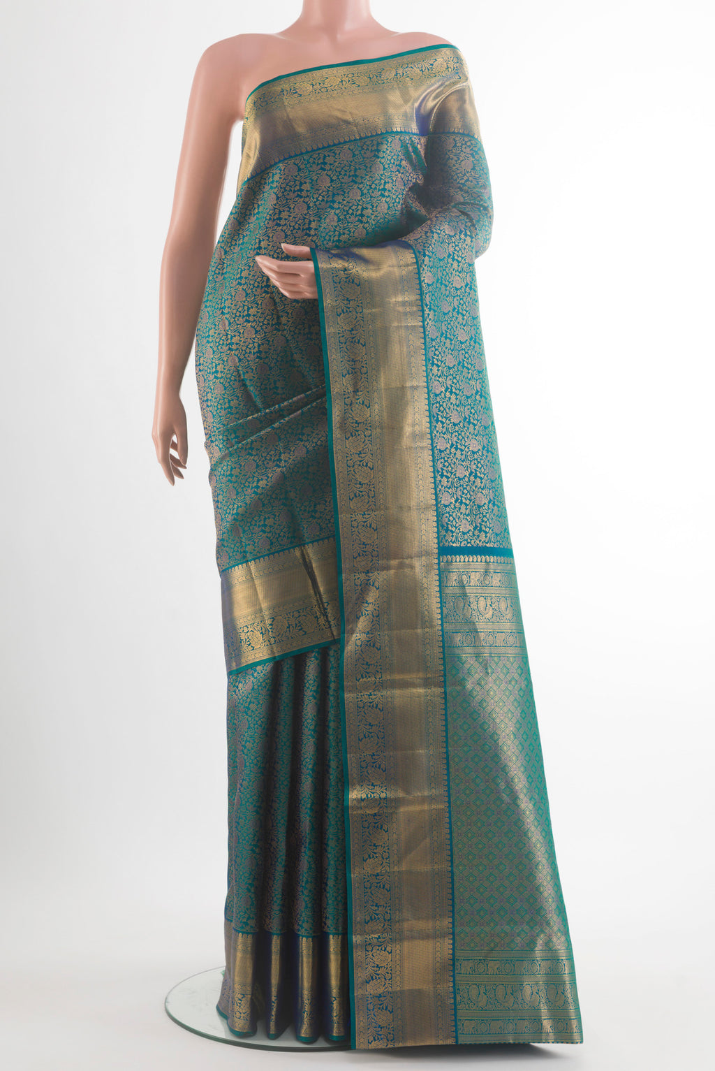 Pure Silk Peacock Blue Dual Tone Kanchipuram Saree with Zari Brocade on the body and Zari Border.  displayed on a mannequin
