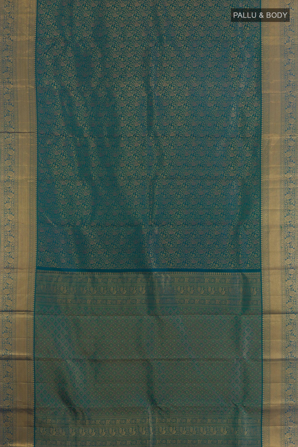 Flat view of Pure Silk Peacock Blue Dual Tone Kanchipuram Saree with Zari Brocade on the body and Zari Border. 