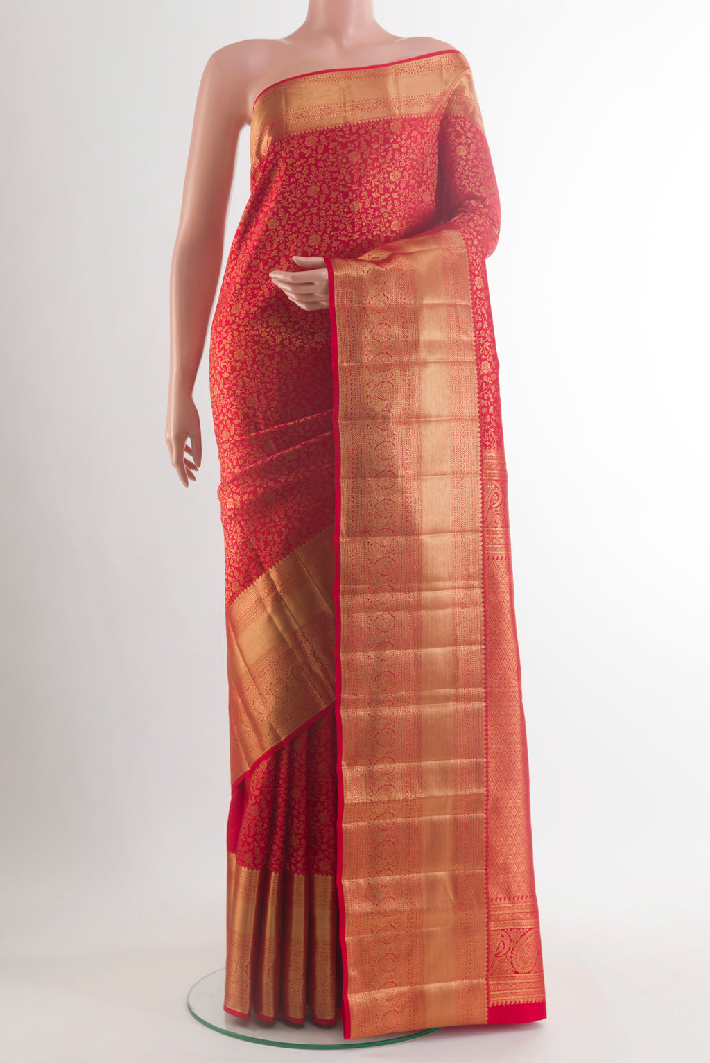Pure Silk Red Kanchipuram Saree with Zari Brocade on the body and Zari Border.  displayed on a mannequin