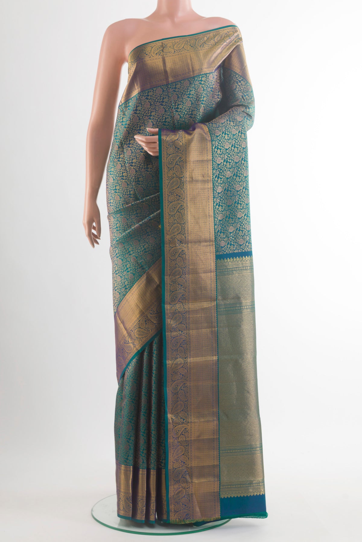 Pure Silk Peacock Blue Dual Tone Kanchipuram Saree with Zari Brocade on the body and Zari Border.  displayed on a mannequin