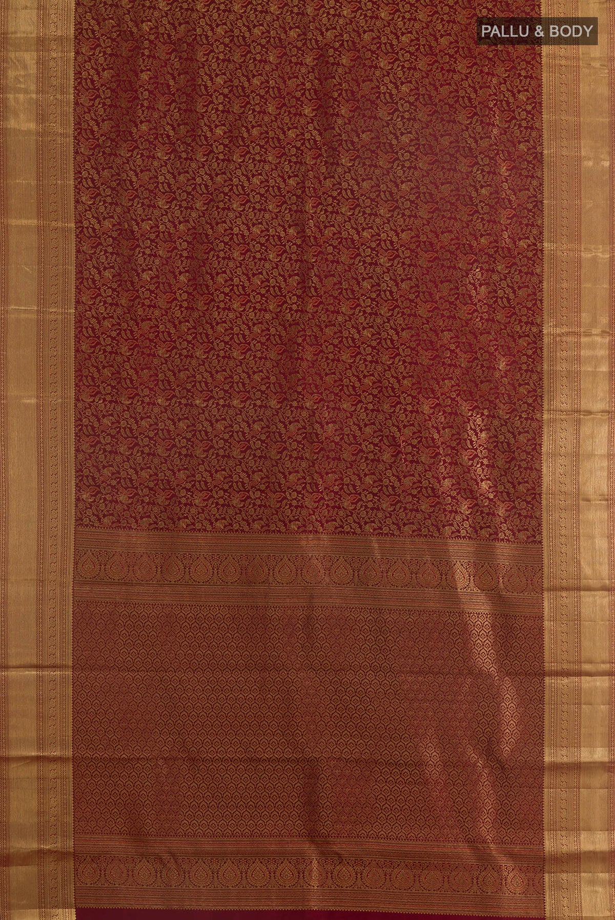 Flat view of Pure Silk Maroon Kanchipuram Saree with Zari Brocade on the body and Zari Border. 