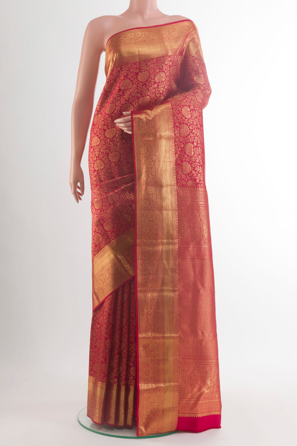 Pure Silk Red Kanchipuram Saree with Zari Brocade on the body and Zari Border.  displayed on a mannequin