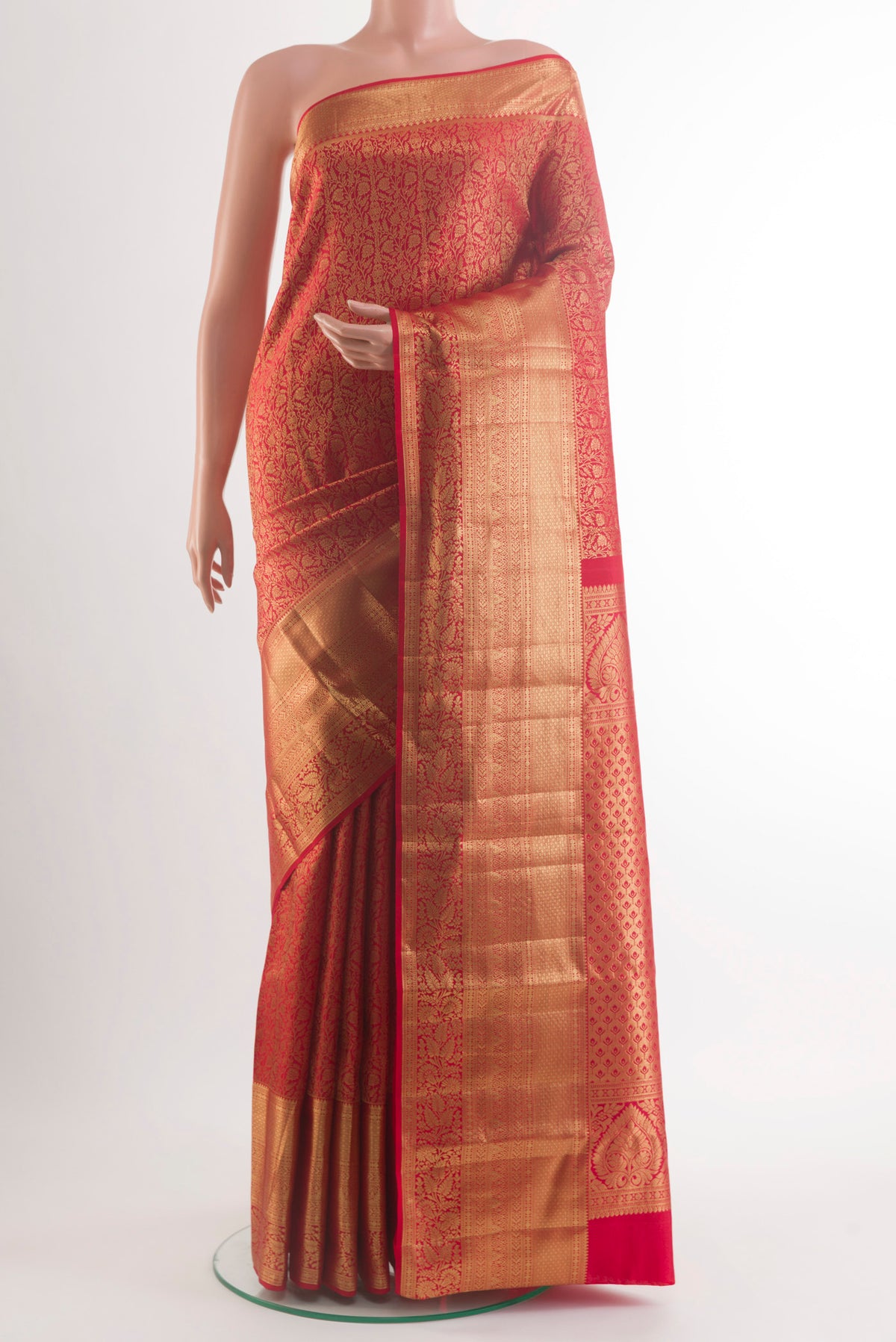Pure Silk Red Kanchipuram Saree with Zari Brocade on the body and Zari Border.  displayed on a mannequin