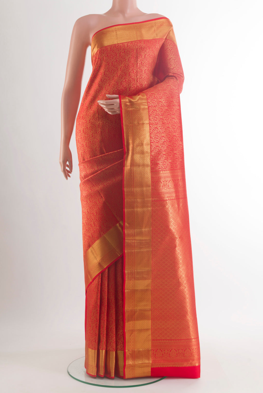 Pure Silk Red Kanchipuram Saree with Zari Brocade on the body and Zari Border.  displayed on a mannequin