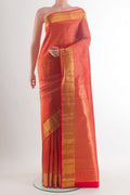 Pure Silk Red Kanchipuram Saree with Zari Brocade on the body and Zari Border.  displayed on a mannequin