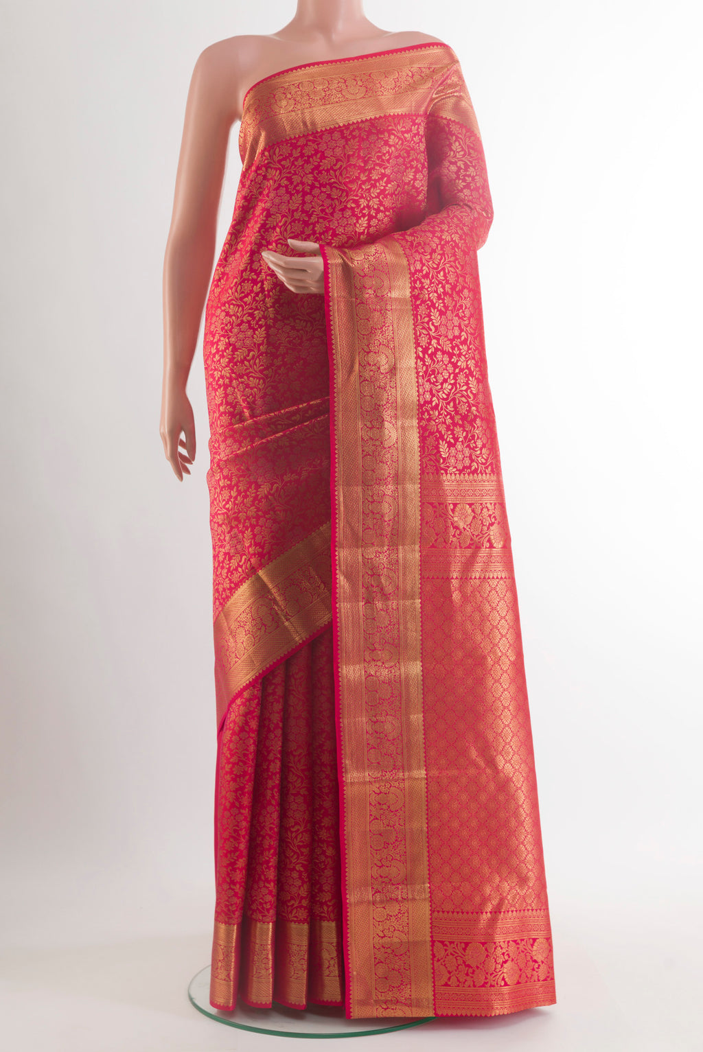 Pure Silk Red Kanchipuram Saree with Zari Brocade on the body and Zari Border.  displayed on a mannequin