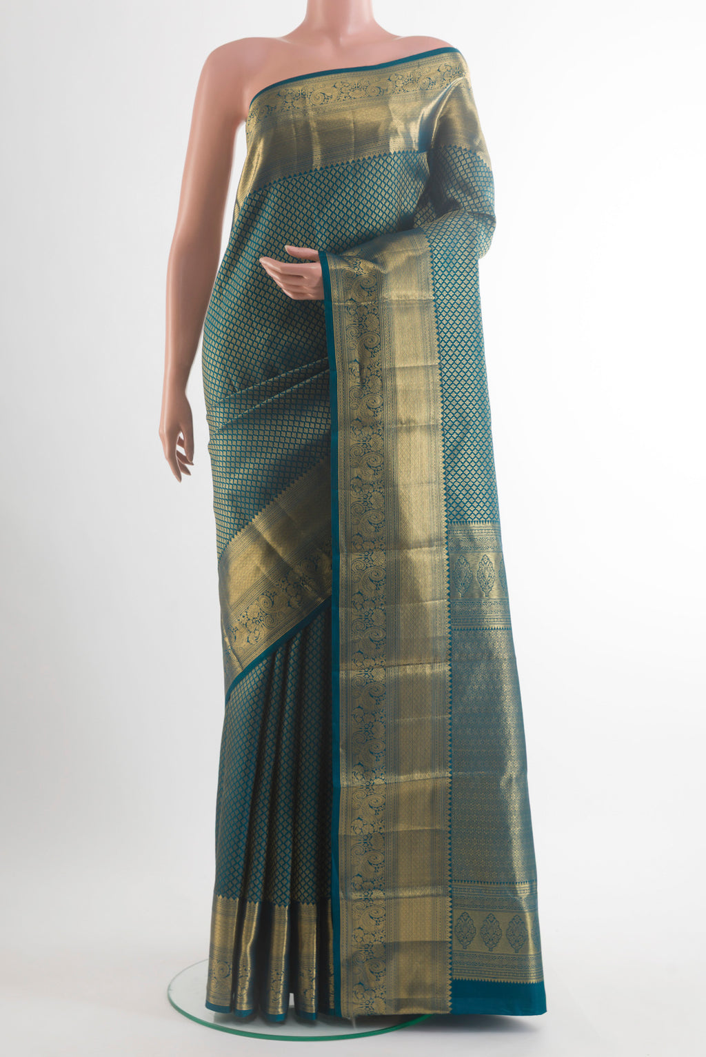Pure Silk Peacock Blue Kanchipuram Saree with Zari Brocade on the body and Zari Border.  displayed on a mannequin
