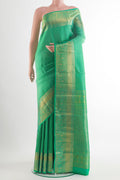 Pure Silk Green Kanchipuram Saree with Zari Brocade on the body and Zari Border.  displayed on a mannequin
