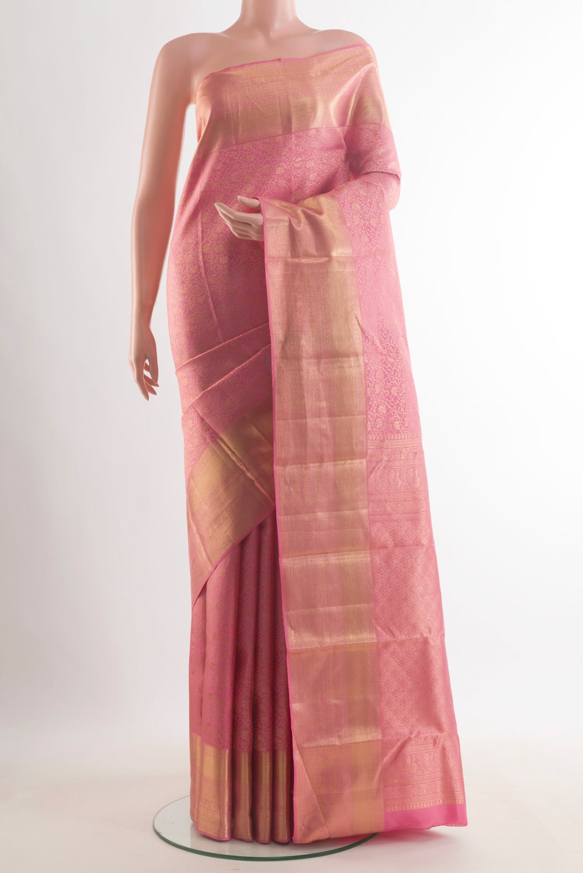 Pure Silk Pink Kanchipuram Saree with Zari Brocade on the body and Zari Border.  displayed on a mannequin