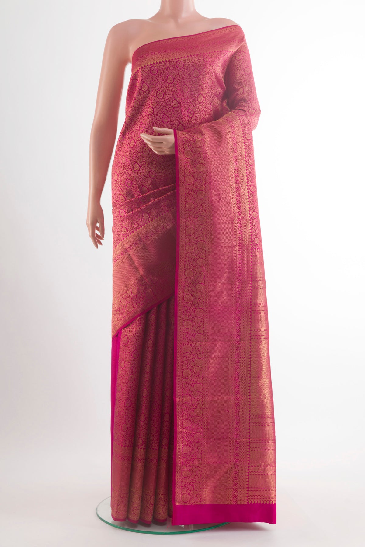 Pure Silk Pink Kanchipuram Saree with Zari Brocade on the body and Zari Border.  displayed on a mannequin