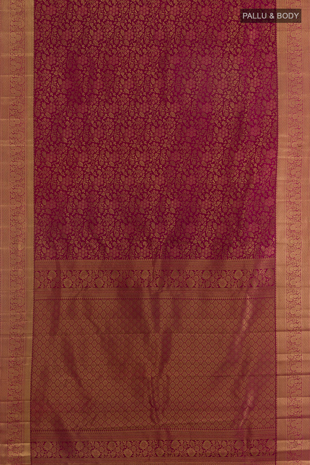 Flat view of Pure Silk Maroon Kanchipuram Saree with Zari Brocade on the body and Zari Border. 