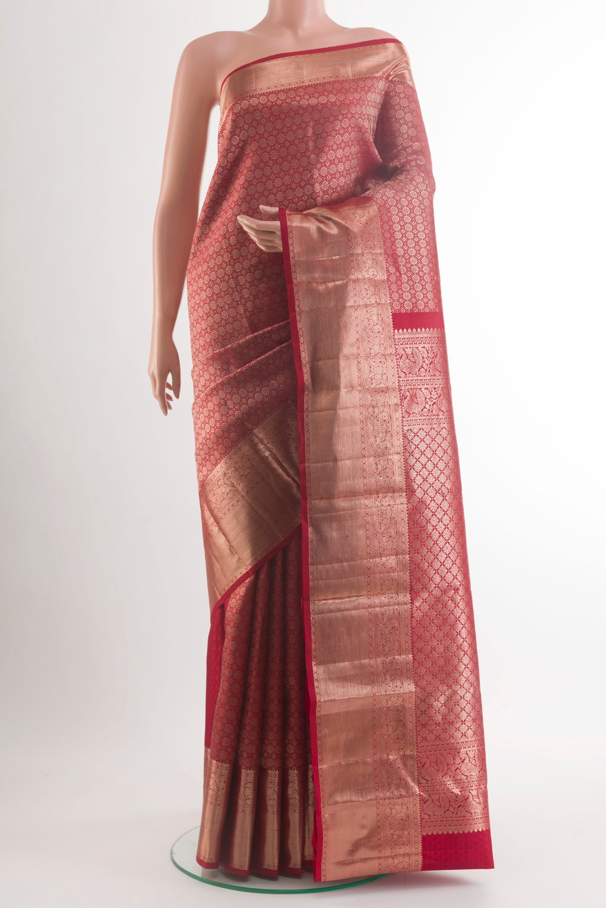 Pure Silk Red Kanchipuram Saree with Zari Brocade on the body and Zari Border.  displayed on a mannequin