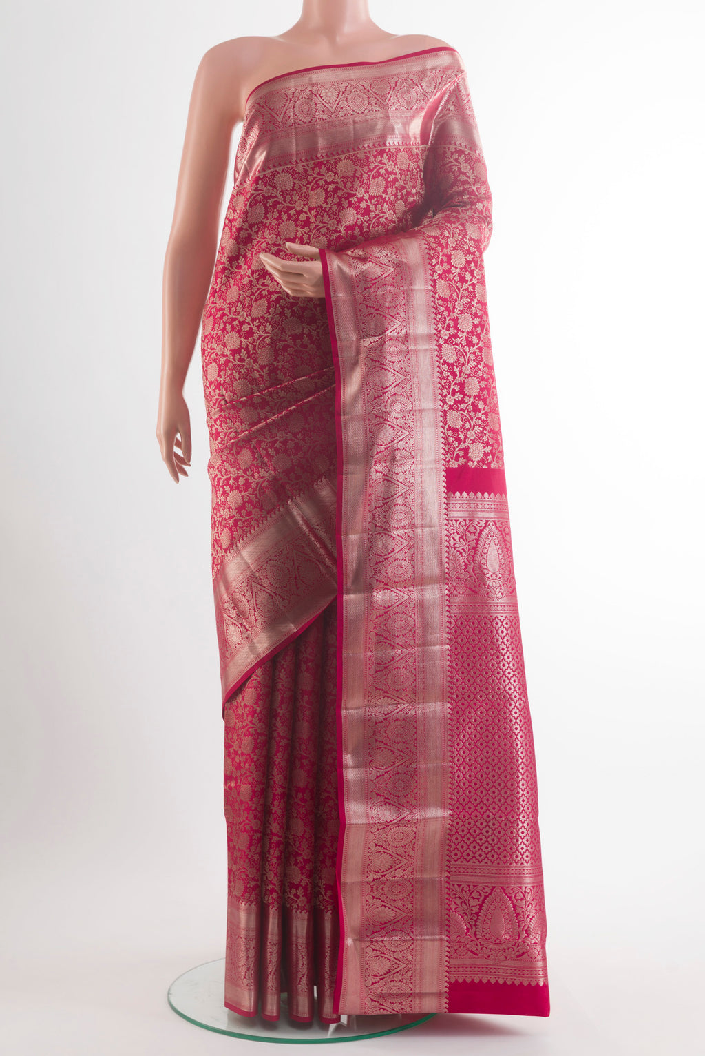Pure Silk Red Kanchipuram Saree with Zari Brocade on the body and Zari Border.  displayed on a mannequin