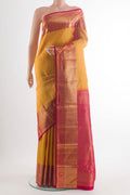 Pure Silk Yellow Kanchipuram Saree with Zari Brocade on the body and Zari Border.  displayed on a mannequin