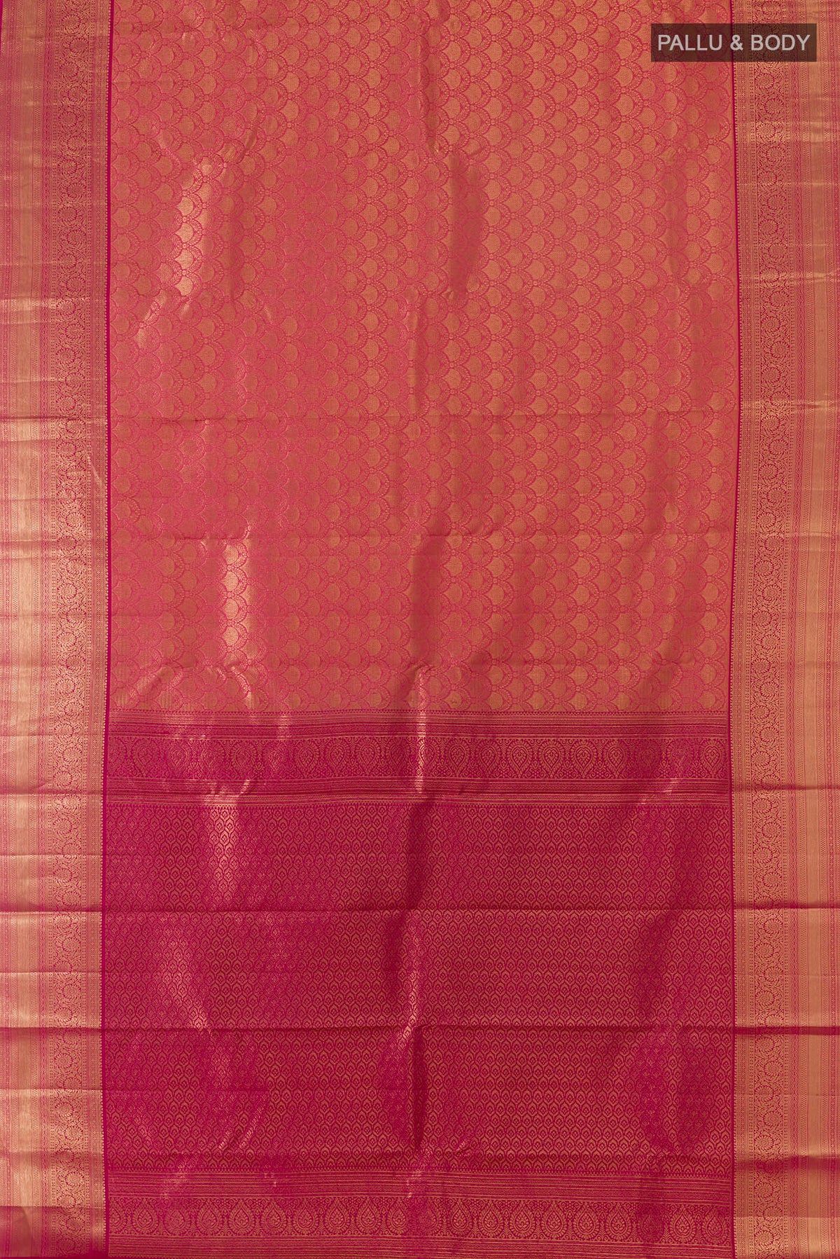 Flat view of Pure Silk Coral Kanchipuram Saree with Zari Brocade on the body and Zari Border. 