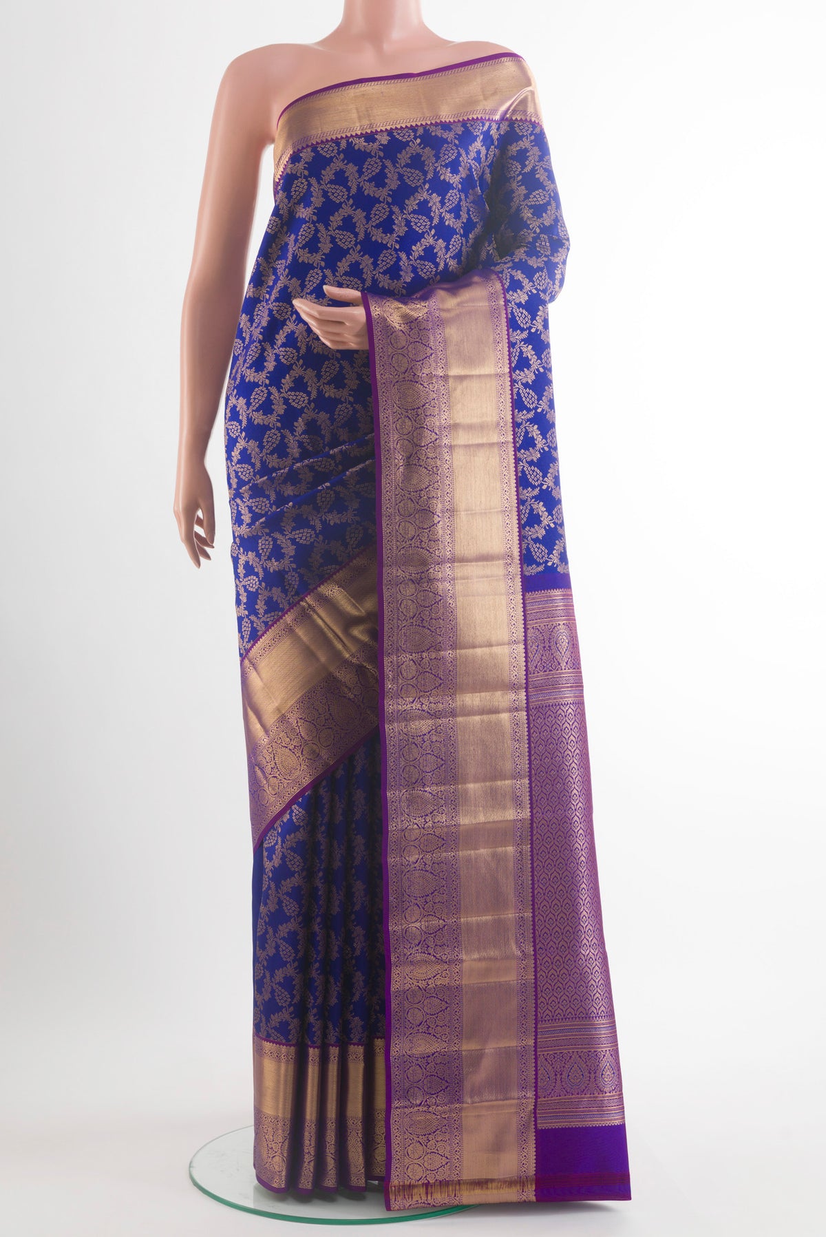 Pure Silk Royal Blue Kanchipuram Saree with Zari Brocade on the body and Zari Border.  displayed on a mannequin