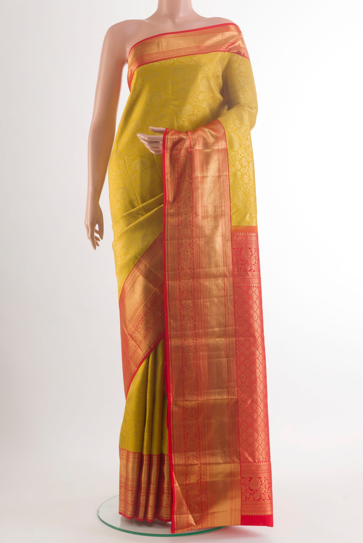 Pure Silk Yellow Kanchipuram Saree with Zari Brocade on the body and Zari Border.  displayed on a mannequin