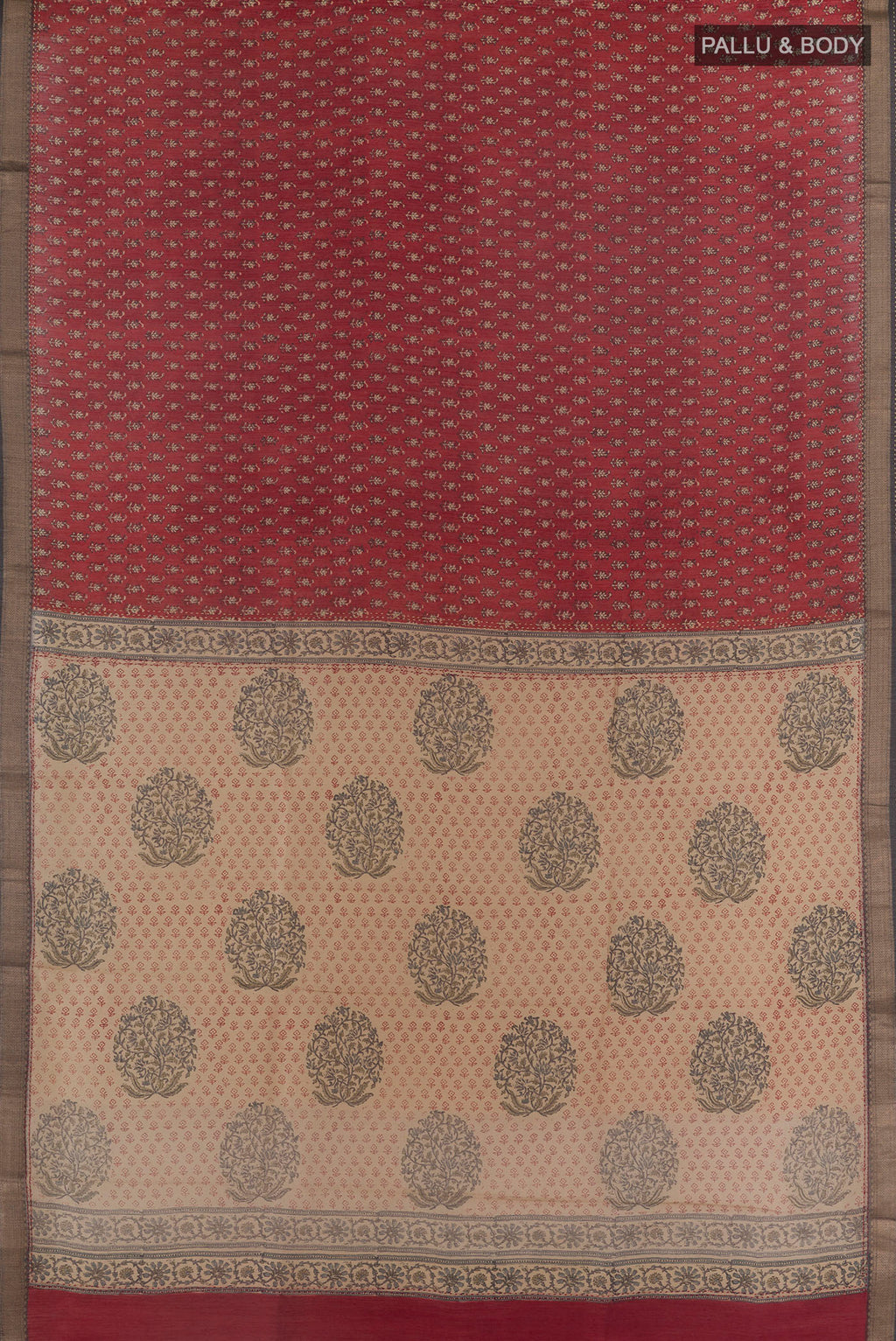 Flat view of Rust Tussar Saree with Printed design on the body and Zari Border. 